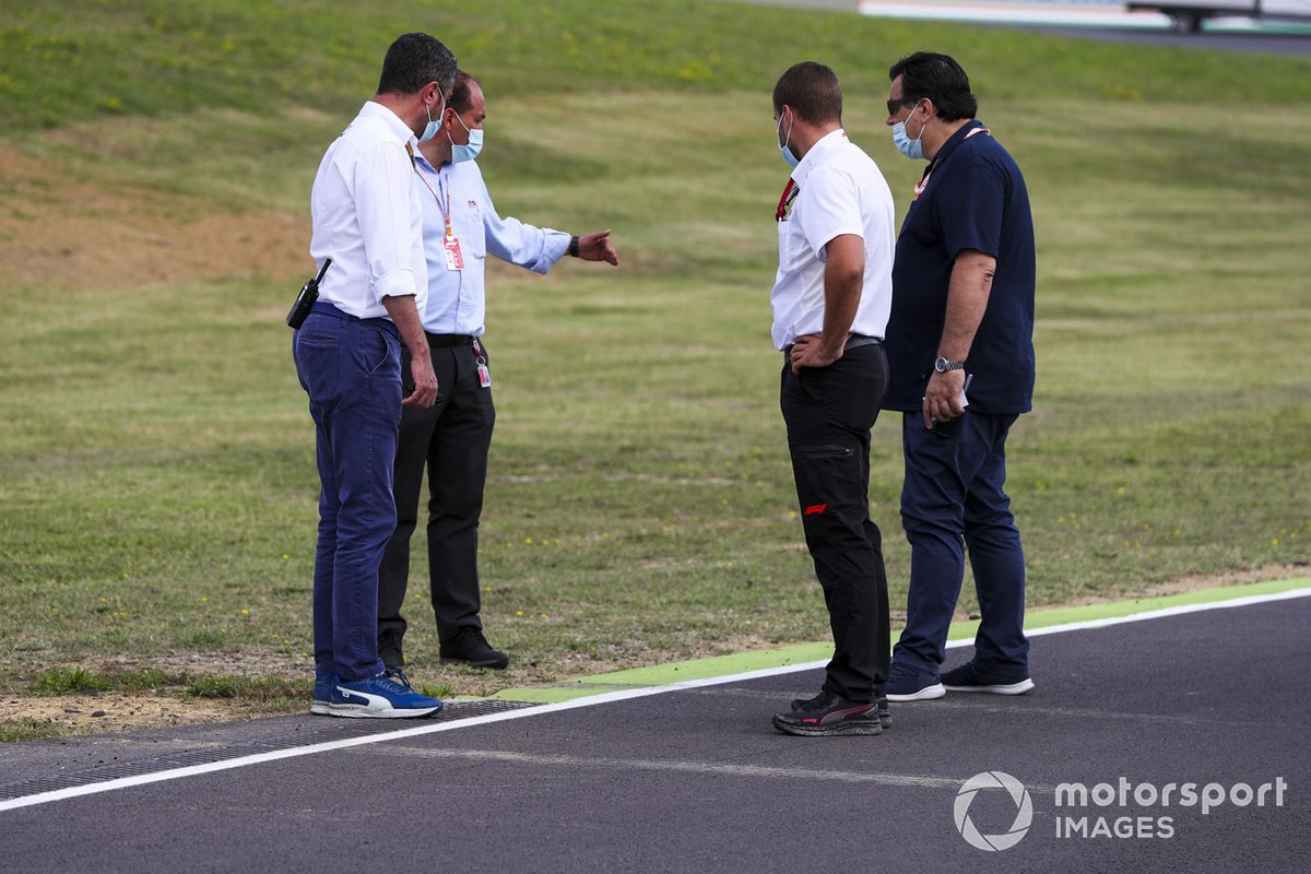 Michael Masi, Race Director and FIA members inspect the track