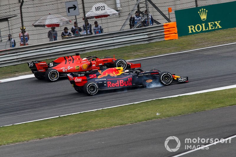 Sebastian Vettel, Ferrari SF90 and Max Verstappen, Red Bull Racing RB15 battle