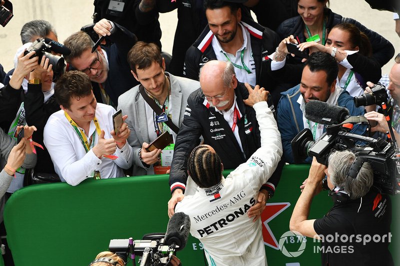 Lewis Hamilton, Mercedes AMG F1, 1st position, celebrates with Dr Dieter Zetsche, CEO, Mercedes Benz, in Parc Ferme