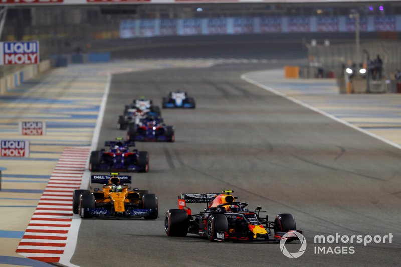 Pierre Gasly, Red Bull Racing RB15, leads Lando Norris, McLaren MCL34, Alexander Albon, Toro Rosso STR14, and Daniil Kvyat, Toro Rosso STR14