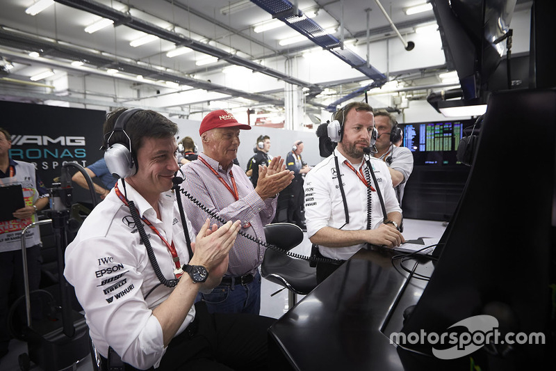 Toto Wolff, Executive Director, Mercedes AMG, and Niki Lauda, Non-Executive Chairman, Mercedes AMG, applaud the efforts of their drivers in Qualifying