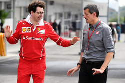 Mattia Binotto, Ferrari Chief Technical Officer and Guenther Steiner, Haas F1 Team Principal