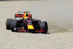 Max Verstappen, Red Bull Racing RB13 spins through the gravel