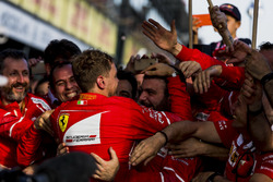 Sebastian Vettel, Ferrari, 1st Position, celebrates in Parc Ferme with his team