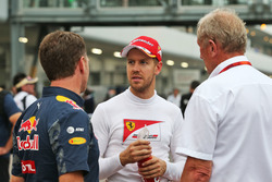 (L to R): Christian Horner, Red Bull Racing Team Principal with Sebastian Vettel, Ferrari and Dr Hel