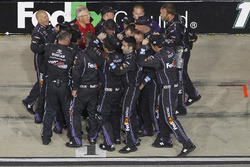 The crew of Denny Hamlin, Joe Gibbs Racing Toyota celebrates