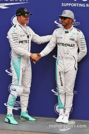 Polesitter Nico Rosberg, Mercedes AMG F1 in parc ferme with team mate Lewis Hamilton, Mercedes AMG F