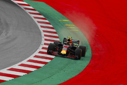Max Verstappen, Red Bull Racing RB14, runs wide over a kerb