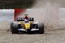 Nelson Piquet Jr, Renault R28 slides into the gravel early in the race