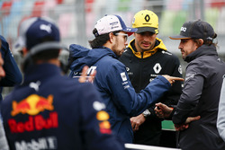Sergio Perez, Force India, Carlos Sainz Jr., Renault Sport F1 Team, and Fernando Alonso, McLaren, talk at the drivers parade