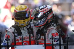 Second place Fernando Alonso, McLaren MP4-22, congratulates third place Lewis Hamilton, McLaren MP4-