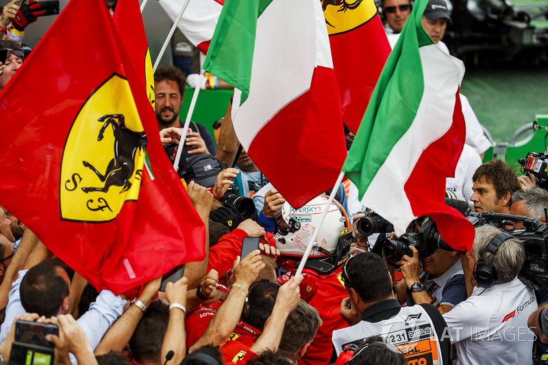 Sebastian Vettel, Ferrari, 1st position, celebrates in Parc Ferme with his team