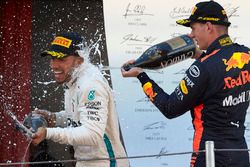 Lewis Hamilton, Mercedes AMG F1, 1st position, Max Verstappen, Red Bull Racing, 3rd position, celebrate with Champagne on the podium