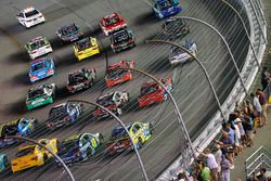 The field goes four-wide to show appreciation to the fans before the race