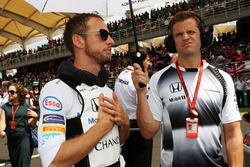 Jenson Button, McLaren on the grid with Mike Collier, Personal Trainer