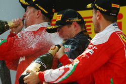 The podium: race winner Max Verstappen, Red Bull Racing, second place Kimi Raikonnen, Scuderia Ferra