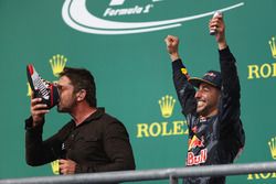 Actor Gerard Butler does a shoey on the podium with 3rd place Daniel Ricciardo, Red Bull Racing