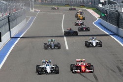 Valtteri Bottas, Williams FW38 and Kimi Raikkonen, Ferrari SF16-H battle for position