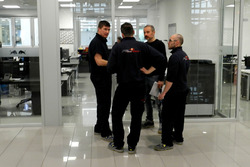 Mechanics in the Scuderia Toro Rosso workshop