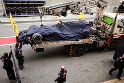 The Red Bull Racing RB13 of Max Verstappen, Red Bull Racing is recovered back to the pits on the bac