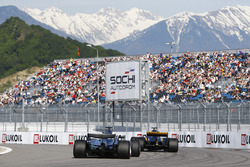 Lewis Hamilton, Mercedes AMG F1 W08, chases Nico Hulkenberg, Renault Sport F1 Team RS17