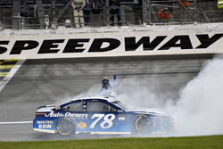 Martin Truex Jr., Furniture Row Racing Toyota celebrates his win with a burnout