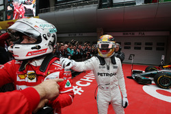 Winner Lewis Hamilton, Mercedes AMG, greets Sebastian Vettel, Ferrari, in parc ferme
