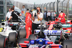 Sebastian Vettel, Ferrari, inspects the car of Lewis Hamilton, Mercedes AMG F1 W08, in Parc Ferme after Qualifying