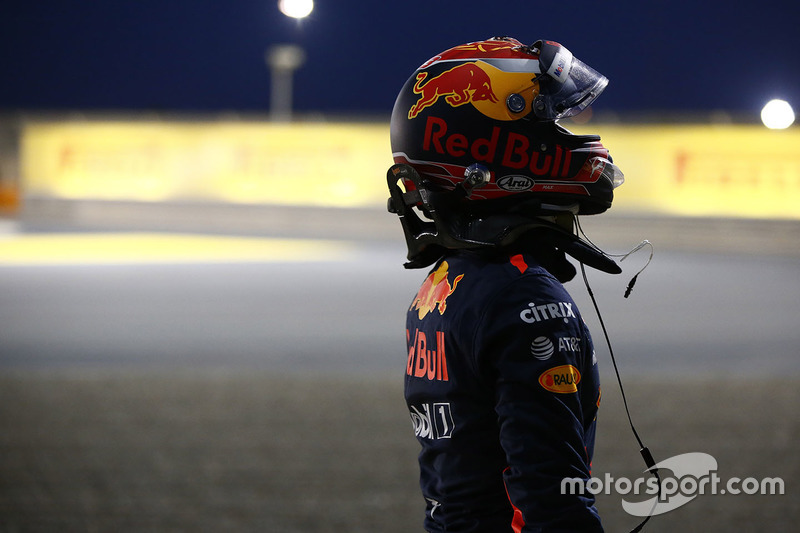 Max Verstappen, Red Bull Racing, climbs out of his car after retiring