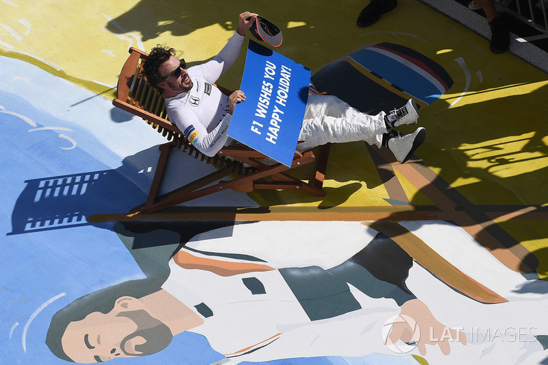 Fernando Alonso, McLaren on a deck chair in parc ferme