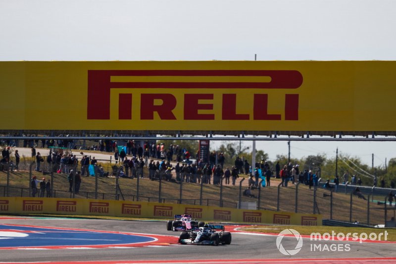 Valtteri Bottas, Mercedes AMG W10, leads Sergio Perez, Racing Point RP19