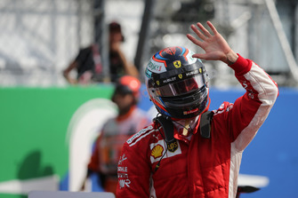 Pole sitter Kimi Raikkonen, Ferrari celebrates in parc ferme