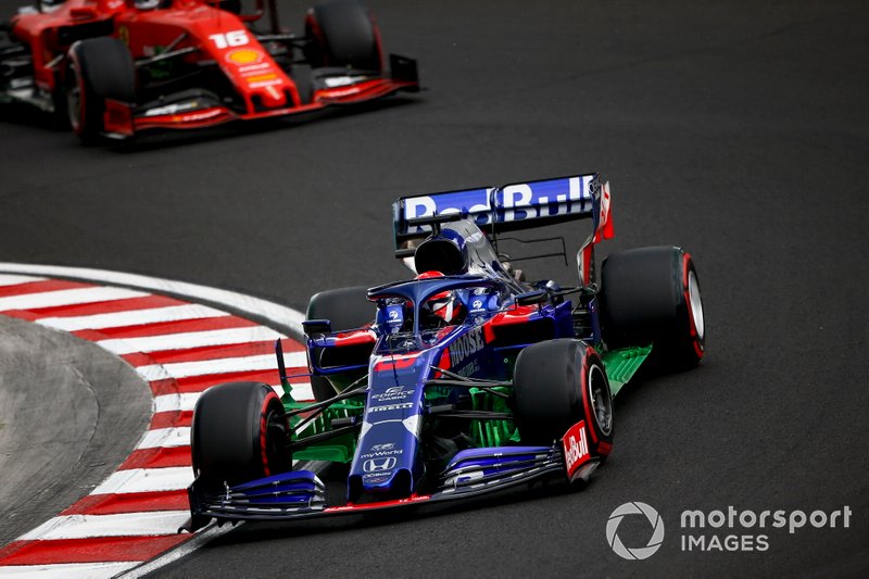 Daniil Kvyat, Toro Rosso STR14, leads Charles Leclerc, Ferrari SF90