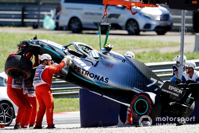 Car of Valtteri Bottas, Mercedes AMG W10 being recovered after crash