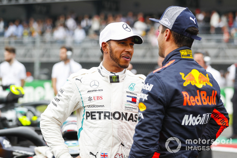 Lewis Hamilton, Mercedes AMG F1, congratulates Daniel Ricciardo, Red Bull Racing, on pole