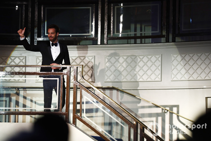 FIA Formula E Champion Jean Eric Vergne enters the room