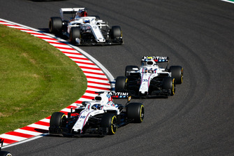 Lance Stroll, Williams FW41, leads Sergey Sirotkin, Williams FW41, and Marcus Ericsson, Sauber C37