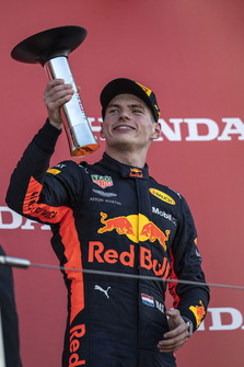 Max Verstappen, Red Bull Racing celebrates with the trophy on the podium