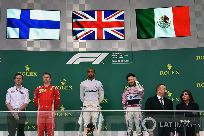 Kimi Raikkonen, Ferrari, Lewis Hamilton, Mercedes-AMG F1 and Sergio Perez, Force India on the podium