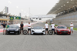 Max Verstappen, Red Bull Racing, Daniel Ricciardo, Red Bull Racing, with the Aston Martin Vanquish S