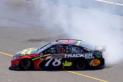 Martin Truex Jr., Furniture Row Racing, Toyota Camry 5-hour ENERGY/Bass Pro Shops celebrates his win with a burnout