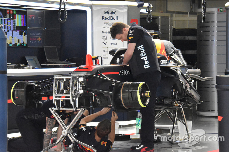 Red Bull Racing team members at work