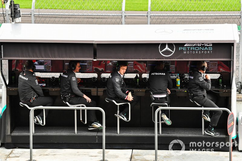 The Mercedes team on the pit wall