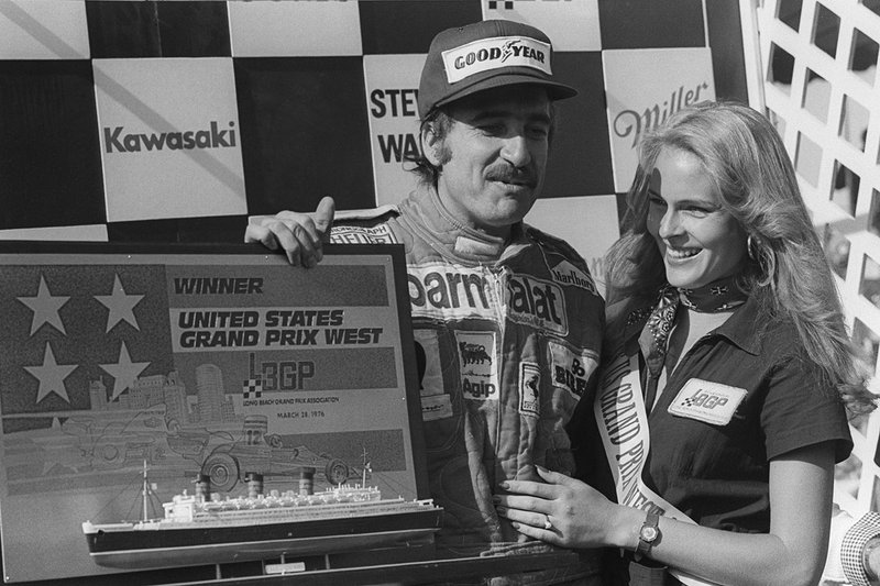 Clay Regazzoni, Ferrari, with his model of the Queen Mary boat for a winner's trophy
