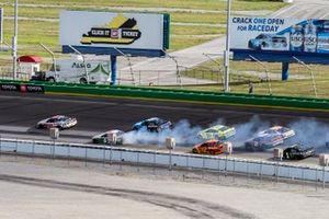 Cole Custer, Stewart-Haas Racing, Ford Mustang takes the lead in the last lap