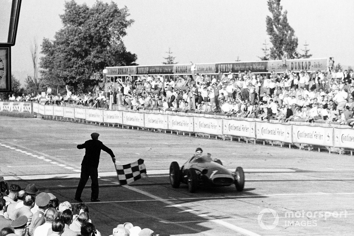 Juan Manuel Fangio, Maserati 250F takes the chequered flag