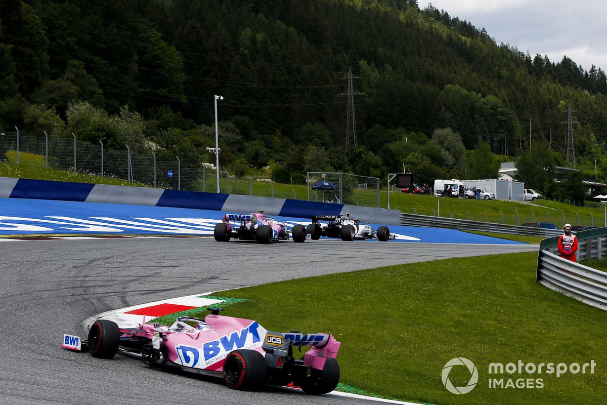 Pierre Gasly, AlphaTauri AT01, precede Lance Stroll, Racing Point RP20, e Sergio Perez, Racing Point RP20