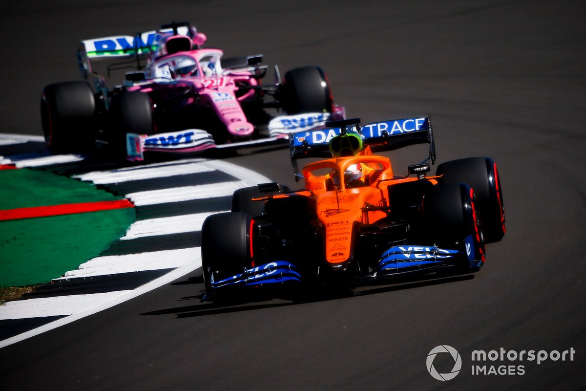 Carlos Sainz Jr., McLaren MCL35 y Nico Hulkenberg, Racing Point RP20