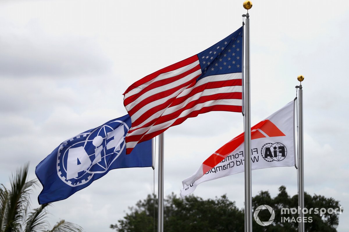 The flags of the United States of America, the FIA, Formula One fly at the circuit
