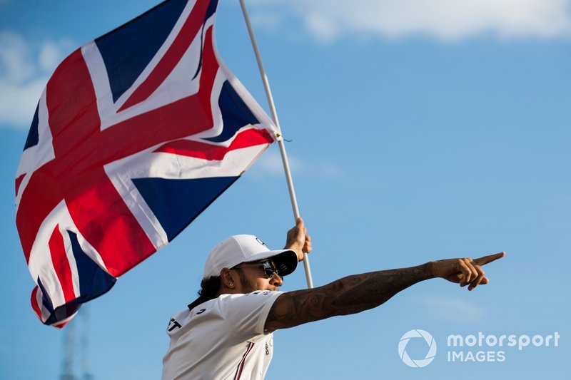 Lewis Hamilton, Mercedes AMG F1, 1st position, celebrates with a Union flag